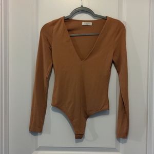 Babaton Body Suit Size Small.